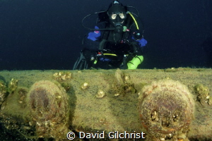 Diver poses at a set of Deadeyes on the Barque 'Arabia', ... by David Gilchrist 